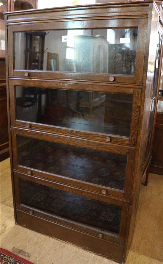 Oak 4-section oak glazed bookcase(-)